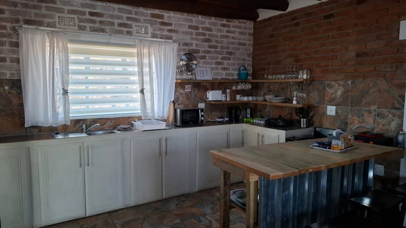 Kitchen counter with bar stools